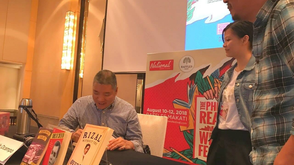 Ambeth Ocampo signing books during the PRWF 2018 at Raffles Makati